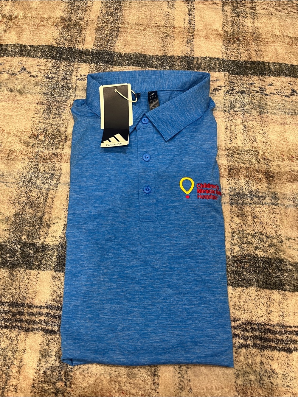 adidas Blue Heather Polo with Children’s miracle network logo